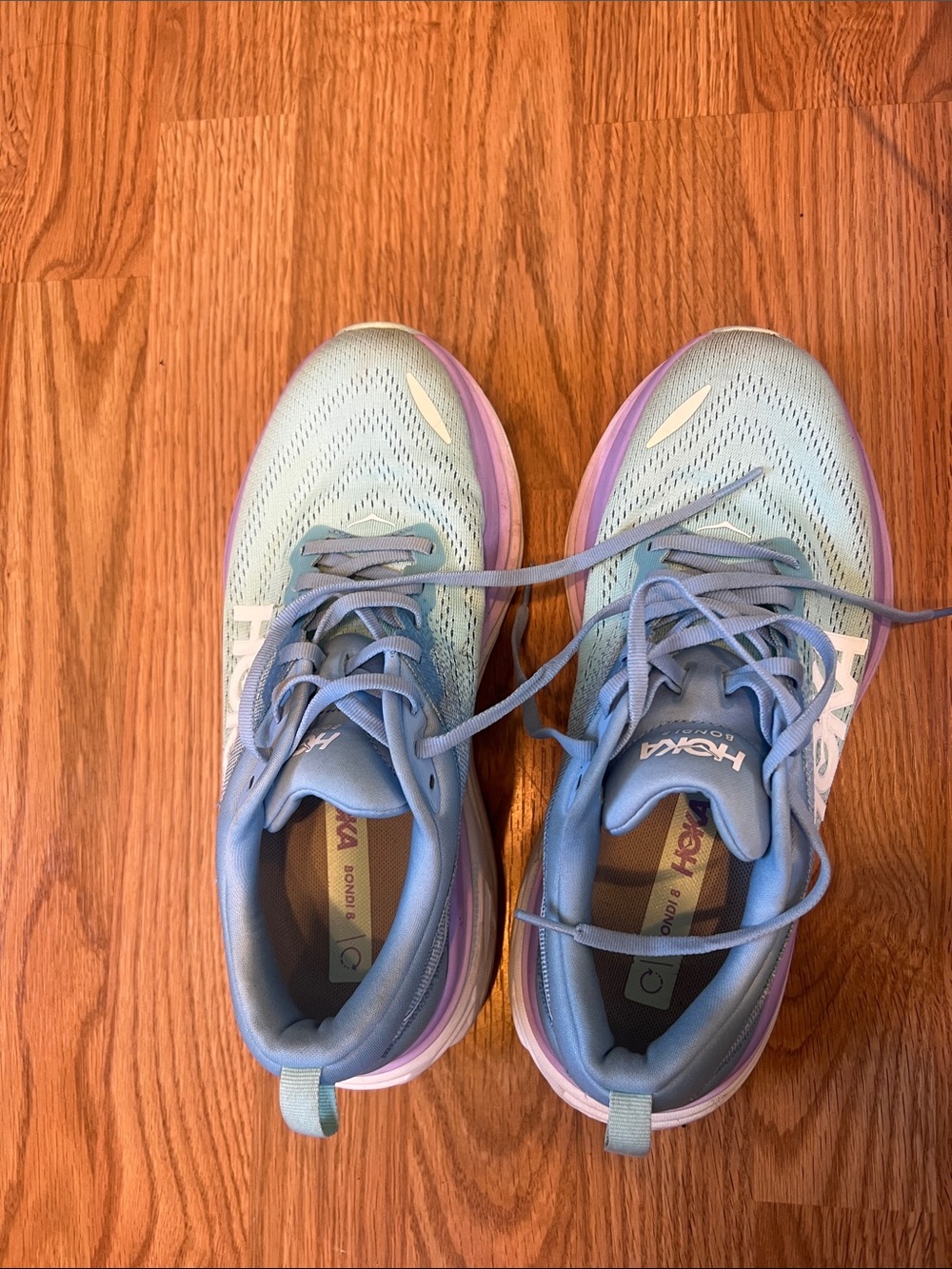 Hoka Women’s Light Blue and Lavender Road Running Shoes bondi 8